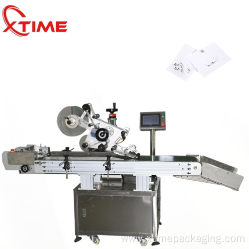 Horizontal labeling machine for syringel vial